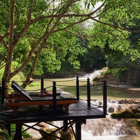 world-of-glamping-rosewood-luang-prabang-waterfall-3.jpg
